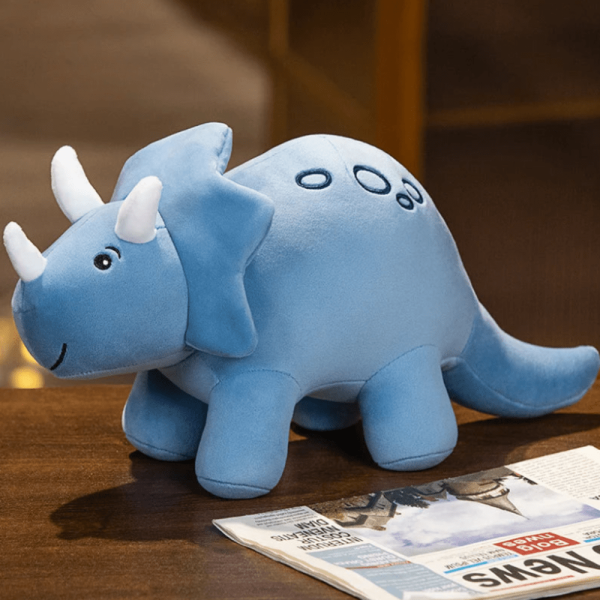 peluche dinosaure bleu à trois cornes