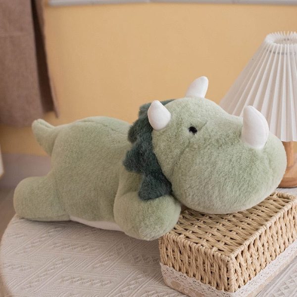 peluche dinosaure petit à cornes blanches