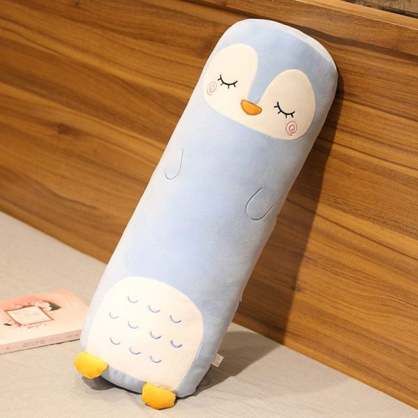 peluche géante pingouin endormi