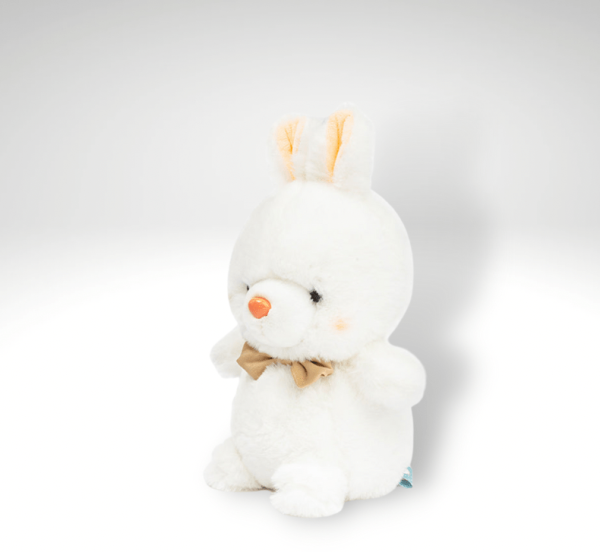 peluche lapin doux avec un nœud