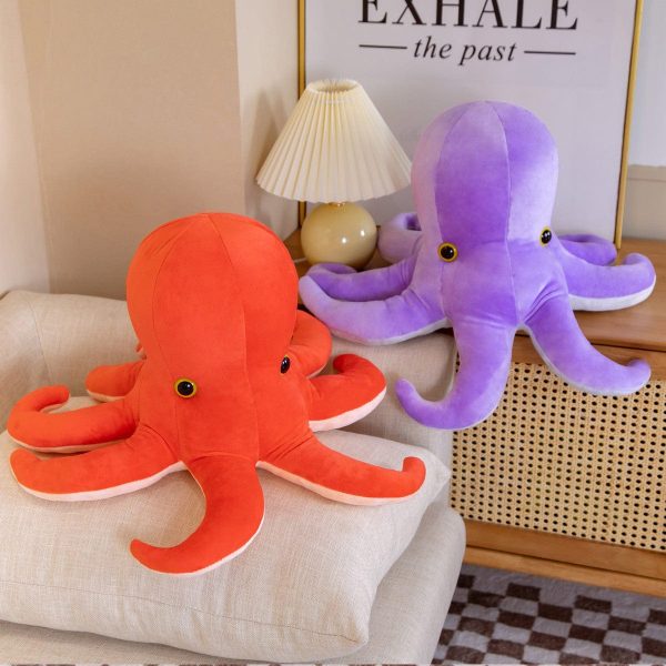 peluche pieuvre orange et violette rayonnante