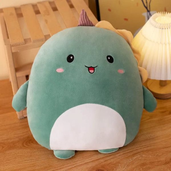 peluche squishmallow dinosaure vert